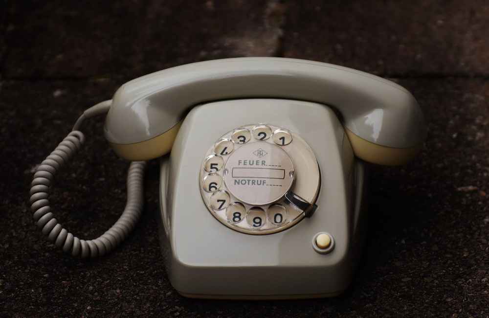 gray rotary telephone